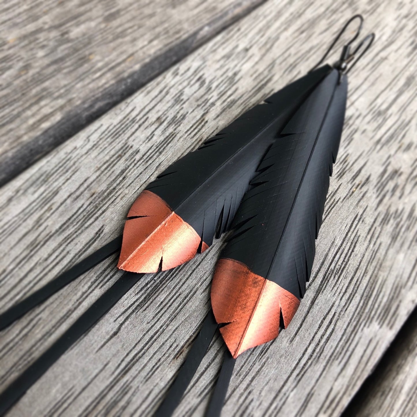 Up-cycled feather earrings copper dipped tips