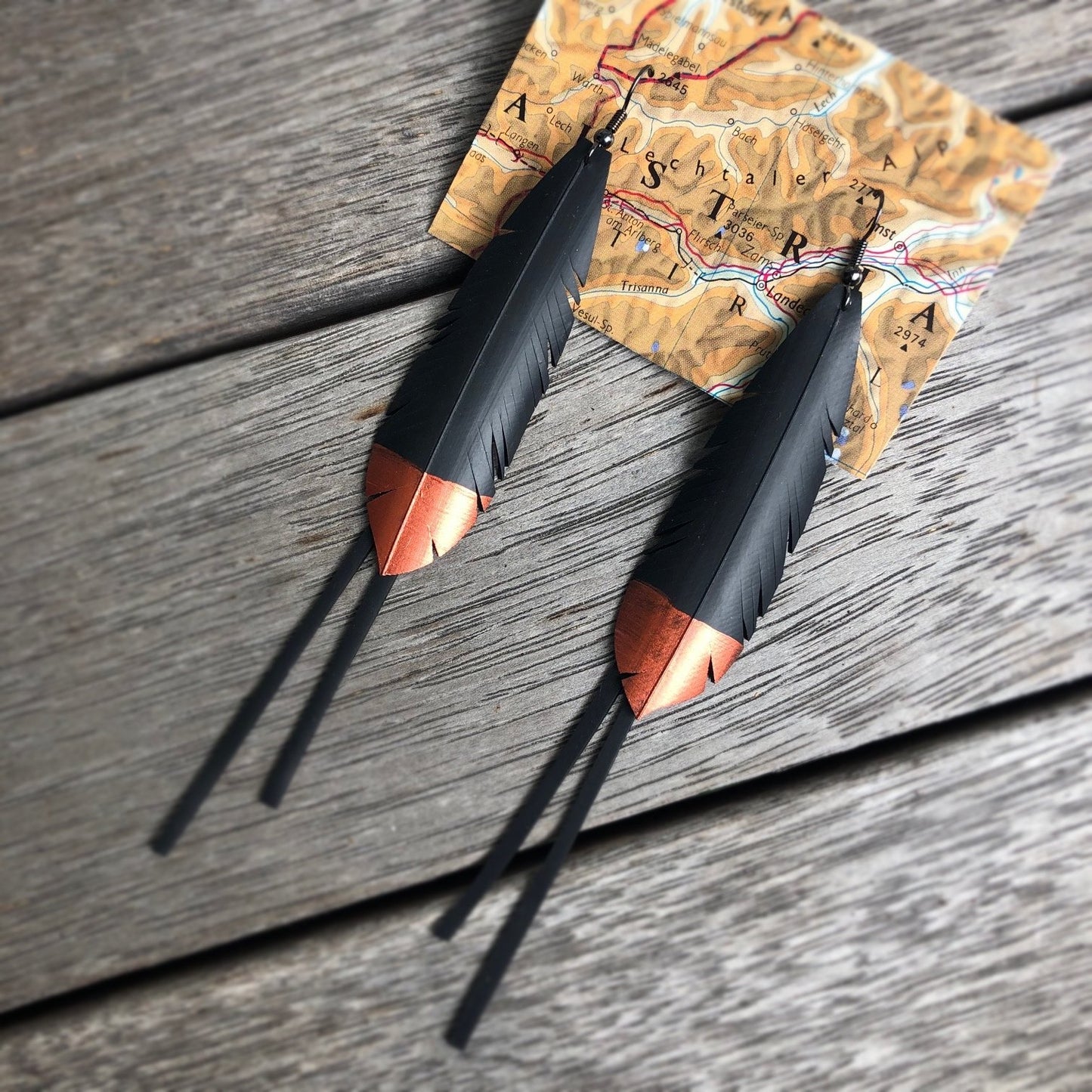 Up-cycled feather earrings copper dipped tips