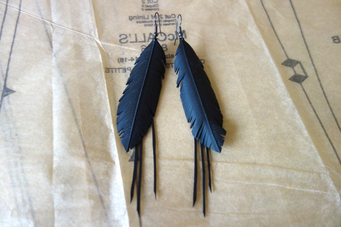 Up-cycled multi string and feather earrings