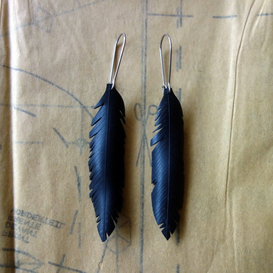 Up-cycled petite single feather earrings